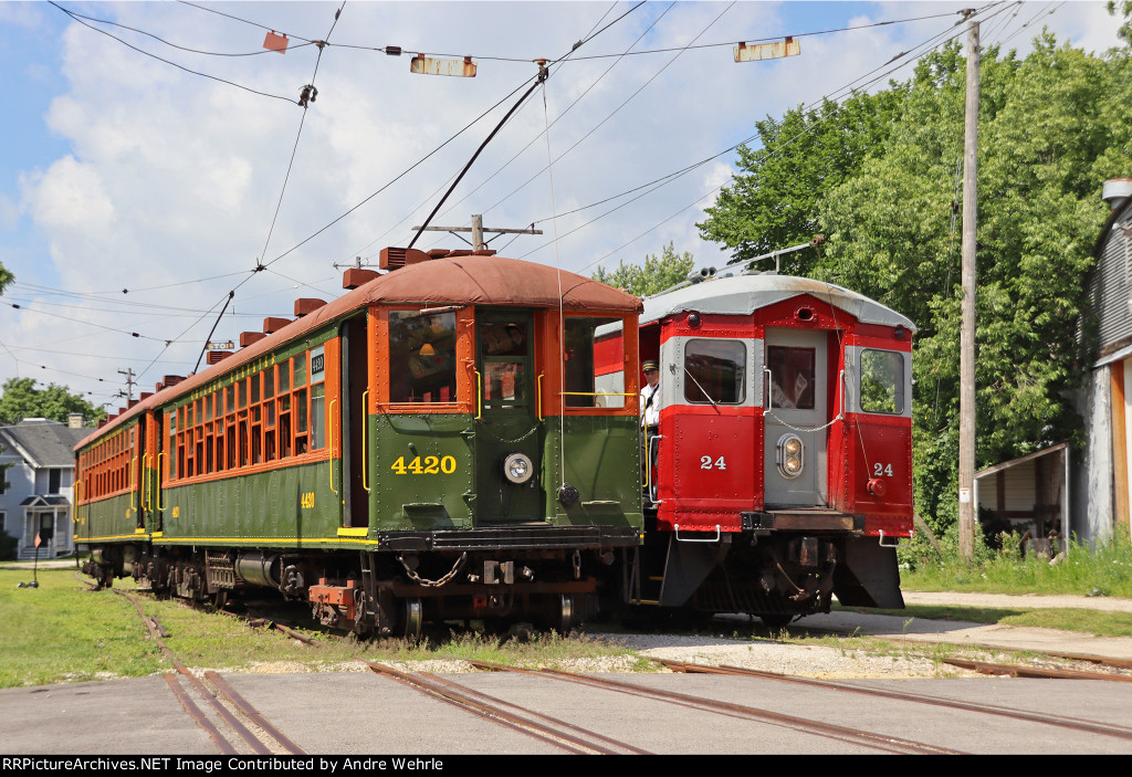 The Chicago El set clears the way for the dinner train set to roll to the platform for boarding of a NRHS Wisconsin Chapter lunch charter